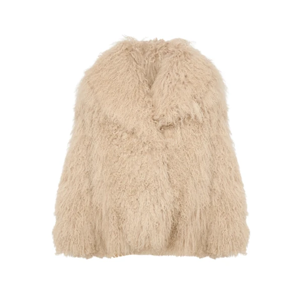 Woman wearing Yves Salomon shearling fur coat – luxury outerwear at Luxury Shoes 