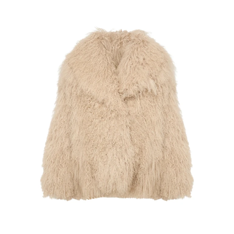 Woman wearing Yves Salomon shearling fur coat – luxury outerwear at Luxury Shoes 