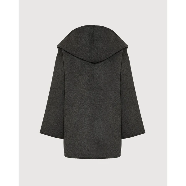 Woman wearing Yves Salomon shearling fur coat – luxury outerwear at Luxury Shoes 