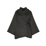 Woman wearing Yves Salomon shearling fur coat – luxury outerwear at Luxury Shoes 