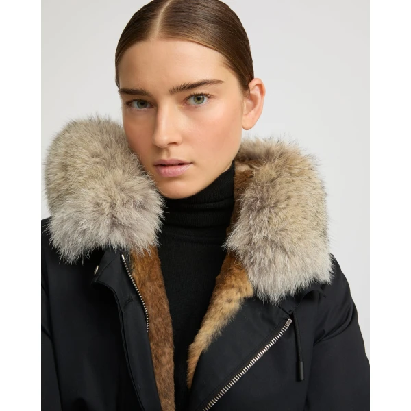 Woman wearing Yves Salomon shearling fur coat – luxury outerwear at Luxury Shoes 