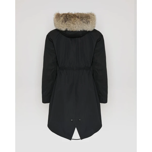 Woman wearing Yves Salomon shearling fur coat – luxury outerwear at Luxury Shoes 