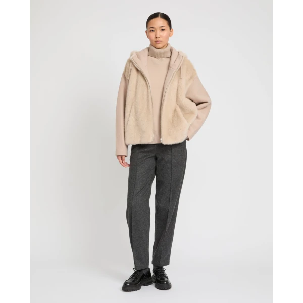 Woman wearing Yves Salomon shearling fur coat – luxury outerwear at Luxury Shoes 