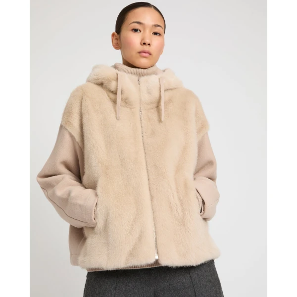 Woman wearing Yves Salomon shearling fur coat – luxury outerwear at Luxury Shoes 