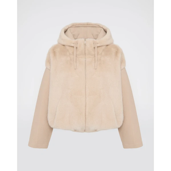 Woman wearing Yves Salomon shearling fur coat – luxury outerwear at Luxury Shoes 