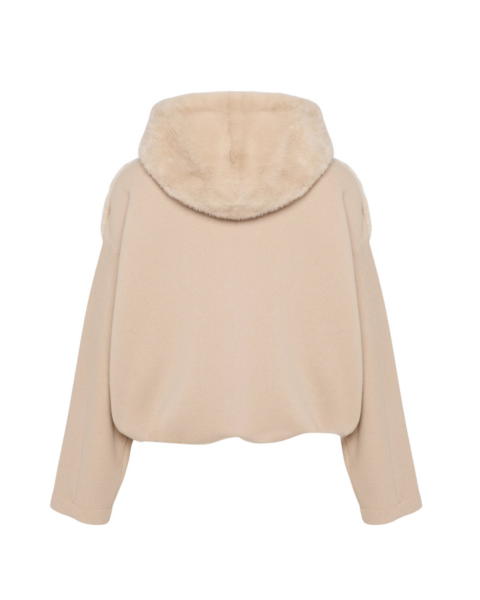 Woman wearing Yves Salomon shearling fur coat – luxury outerwear at Luxury Shoes 