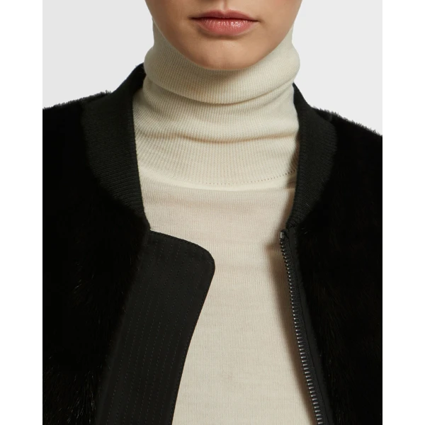 Woman wearing Yves Salomon shearling fur coat – luxury outerwear at Luxury Shoes 