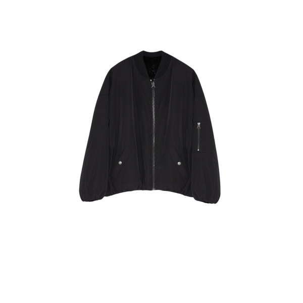 Woman wearing Yves Salomon shearling fur coat – luxury outerwear at Luxury Shoes 