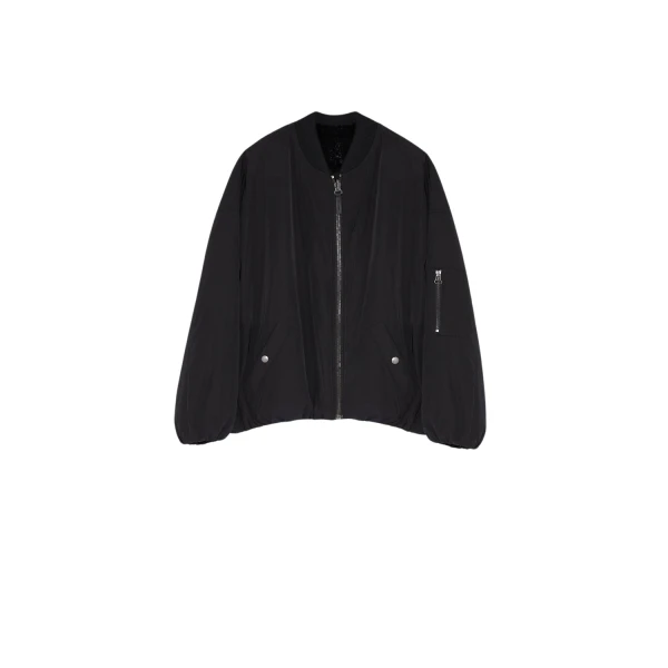 Woman wearing Yves Salomon shearling fur coat – luxury outerwear at Luxury Shoes 