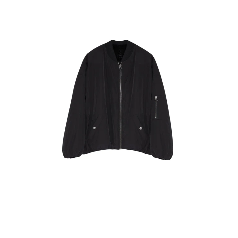 Woman wearing Yves Salomon shearling fur coat – luxury outerwear at Luxury Shoes 