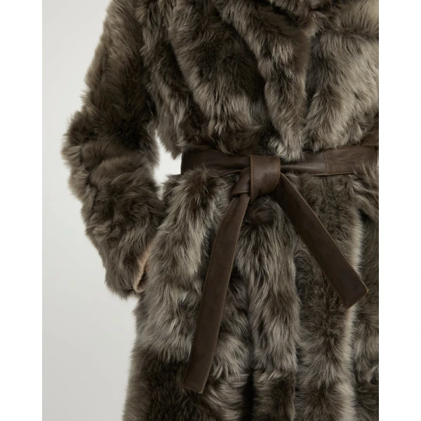 Woman wearing Yves Salomon shearling fur coat – luxury outerwear at Luxury Shoes 
