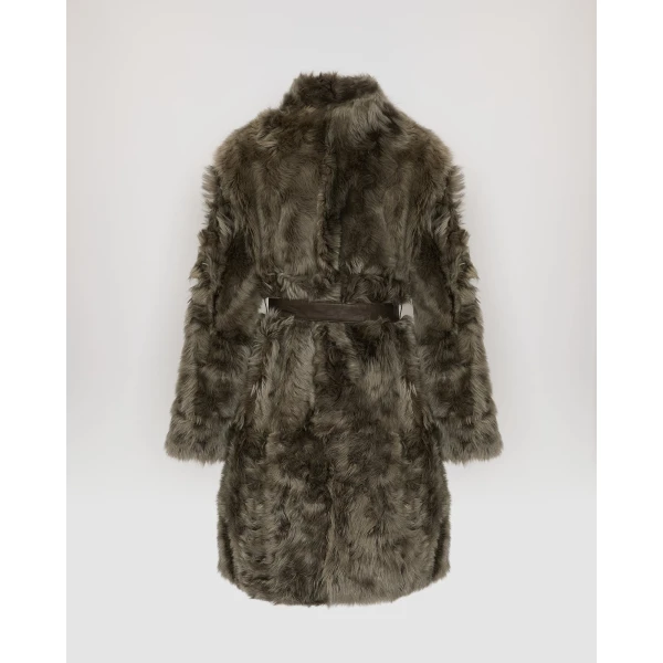 Woman wearing Yves Salomon shearling fur coat – luxury outerwear at Luxury Shoes 