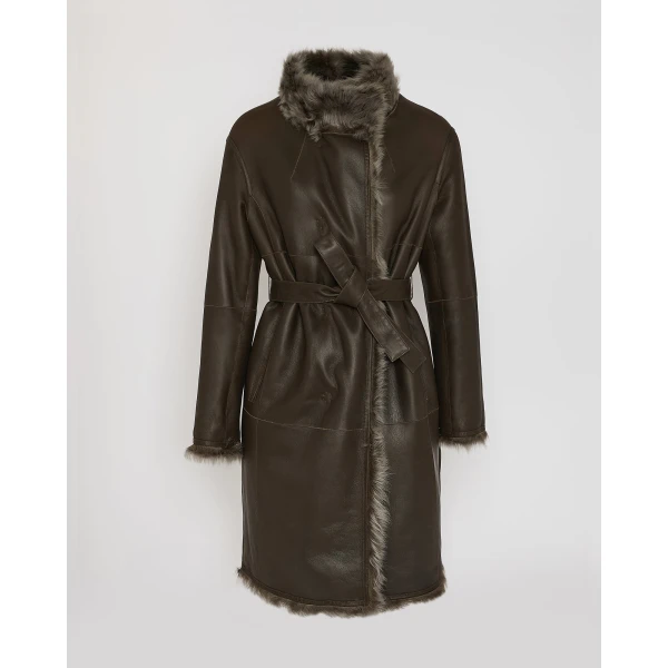 Woman wearing Yves Salomon shearling fur coat – luxury outerwear at Luxury Shoes 