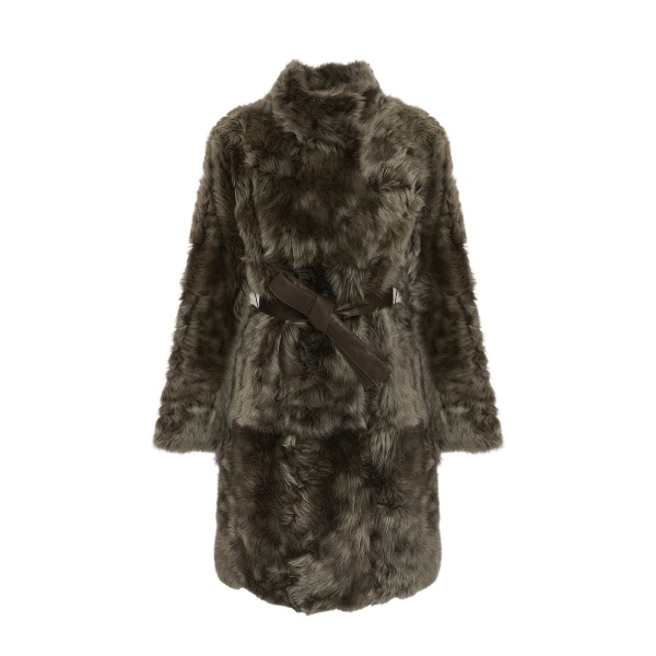 Woman wearing Yves Salomon shearling fur coat – luxury outerwear at Luxury Shoes 