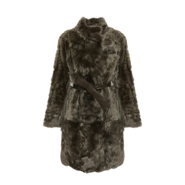 Woman wearing Yves Salomon shearling fur coat – luxury outerwear at Luxury Shoes 
