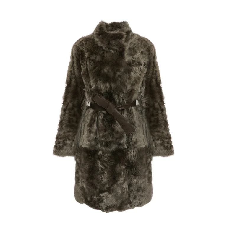 Woman wearing Yves Salomon shearling fur coat – luxury outerwear at Luxury Shoes 