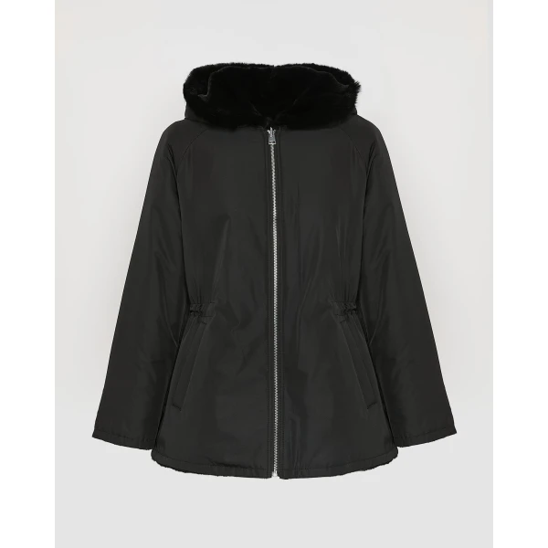 Woman wearing Yves Salomon shearling fur coat – luxury outerwear at Luxury Shoes 