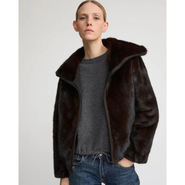 Woman wearing Yves Salomon shearling fur coat – luxury outerwear at Luxury Shoes 