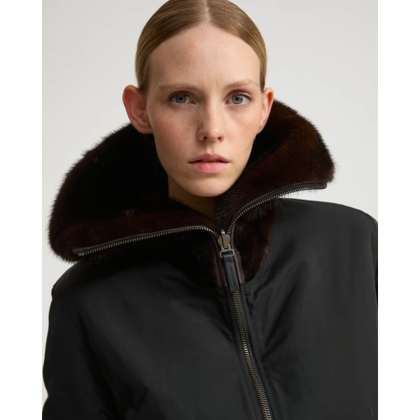 Woman wearing Yves Salomon shearling fur coat – luxury outerwear at Luxury Shoes 