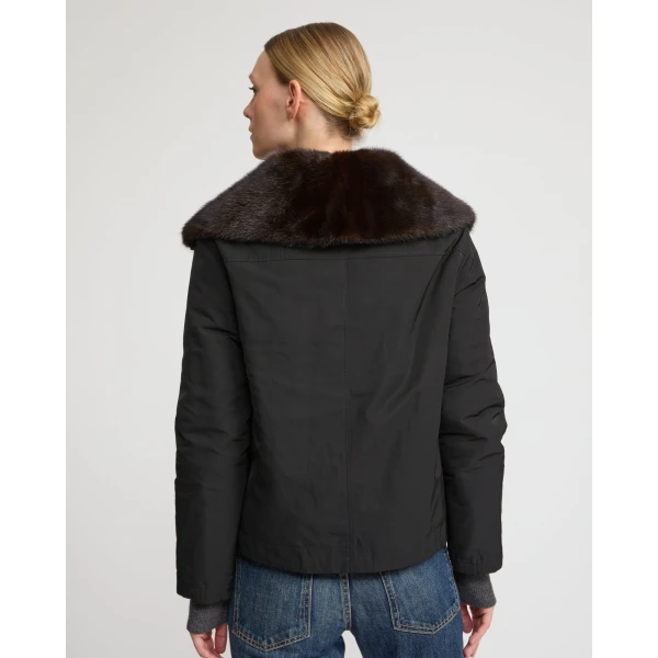Woman wearing Yves Salomon shearling fur coat – luxury outerwear at Luxury Shoes 