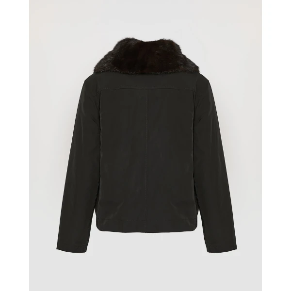 Woman wearing Yves Salomon shearling fur coat – luxury outerwear at Luxury Shoes 