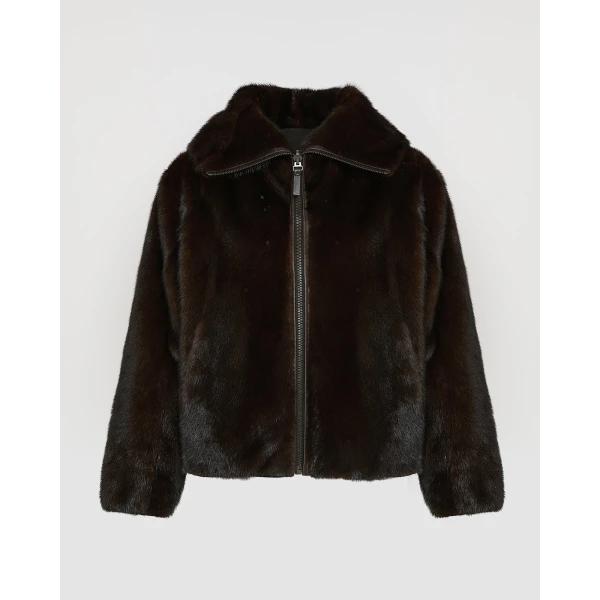 Woman wearing Yves Salomon shearling fur coat – luxury outerwear at Luxury Shoes 
