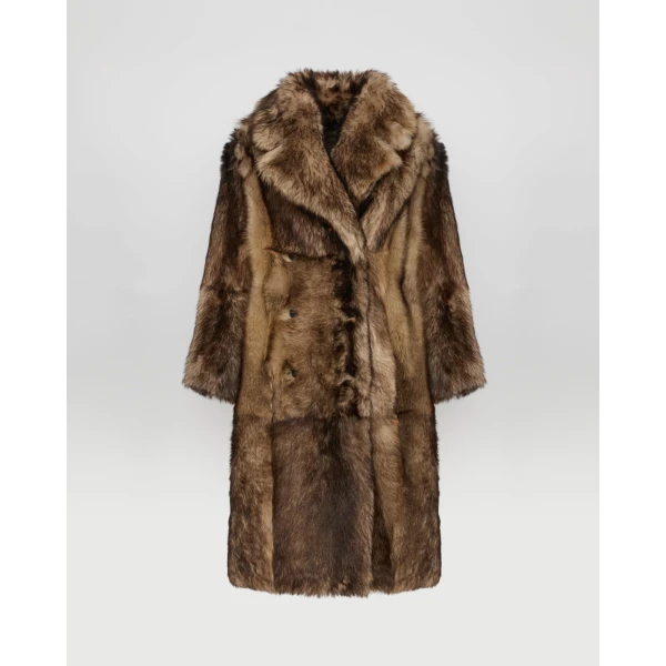 Woman wearing Yves Salomon shearling fur coat – luxury outerwear at Luxury Shoes 