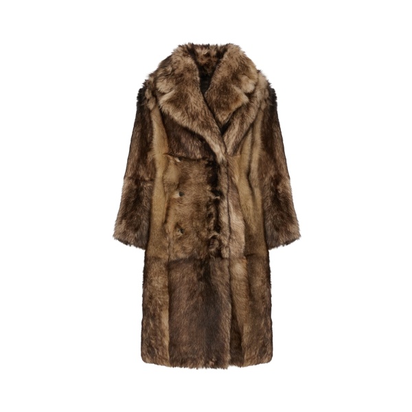 Woman wearing Yves Salomon shearling fur coat – luxury outerwear at Luxury Shoes 