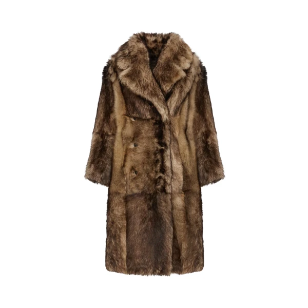 Woman wearing Yves Salomon shearling fur coat – luxury outerwear at Luxury Shoes 