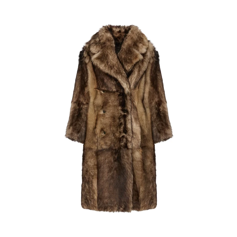 Woman wearing Yves Salomon shearling fur coat – luxury outerwear at Luxury Shoes 
