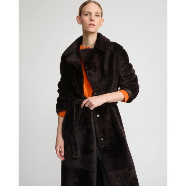 Woman wearing Yves Salomon shearling fur coat – luxury outerwear at Luxury Shoes 