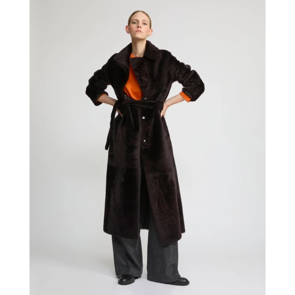 Woman wearing Yves Salomon shearling fur coat – luxury outerwear at Luxury Shoes 