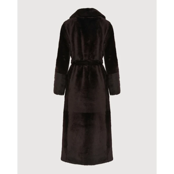 Woman wearing Yves Salomon shearling fur coat – luxury outerwear at Luxury Shoes 