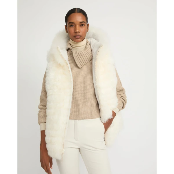 Woman wearing Yves Salomon shearling fur coat – luxury outerwear at Luxury Shoes 