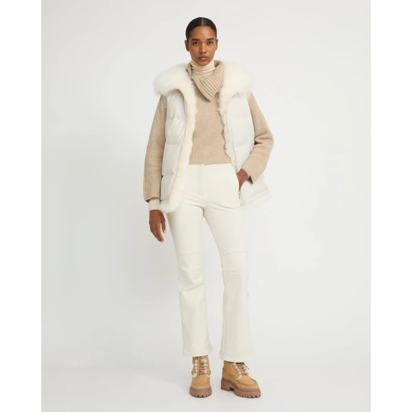 Woman wearing Yves Salomon shearling fur coat – luxury outerwear at Luxury Shoes 