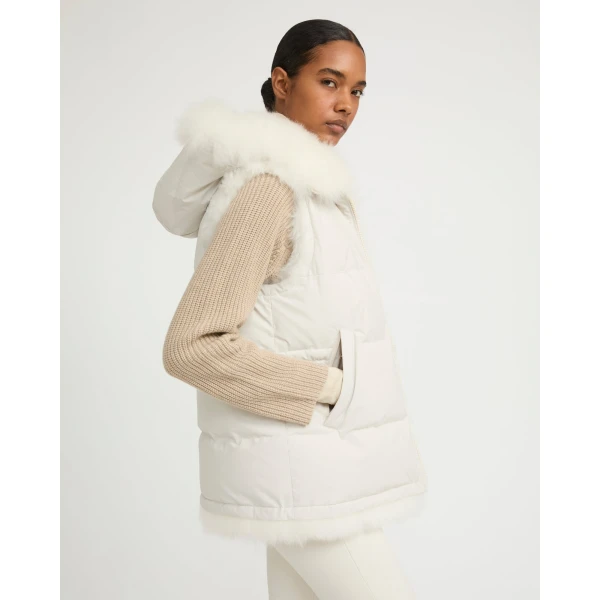 Woman wearing Yves Salomon shearling fur coat – luxury outerwear at Luxury Shoes 