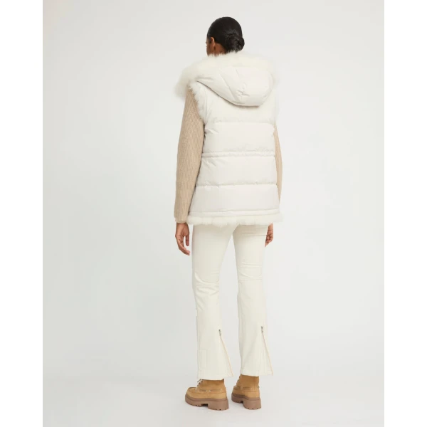 Woman wearing Yves Salomon shearling fur coat – luxury outerwear at Luxury Shoes 