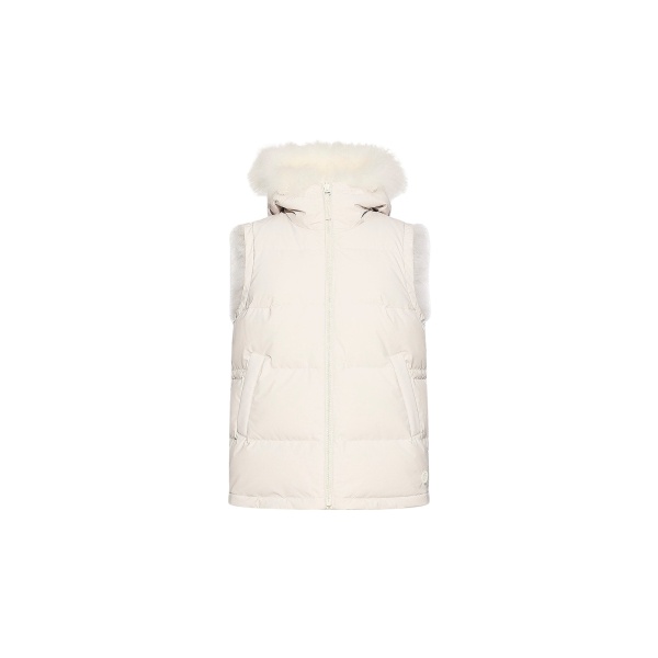 Woman wearing Yves Salomon shearling fur coat – luxury outerwear at Luxury Shoes 