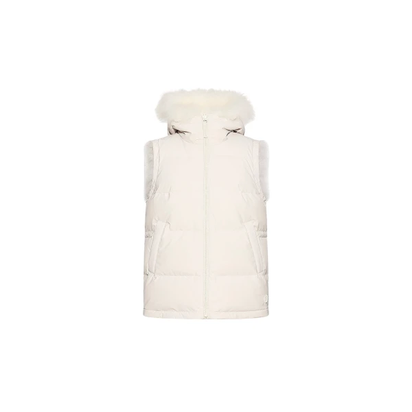 Woman wearing Yves Salomon shearling fur coat – luxury outerwear at Luxury Shoes 