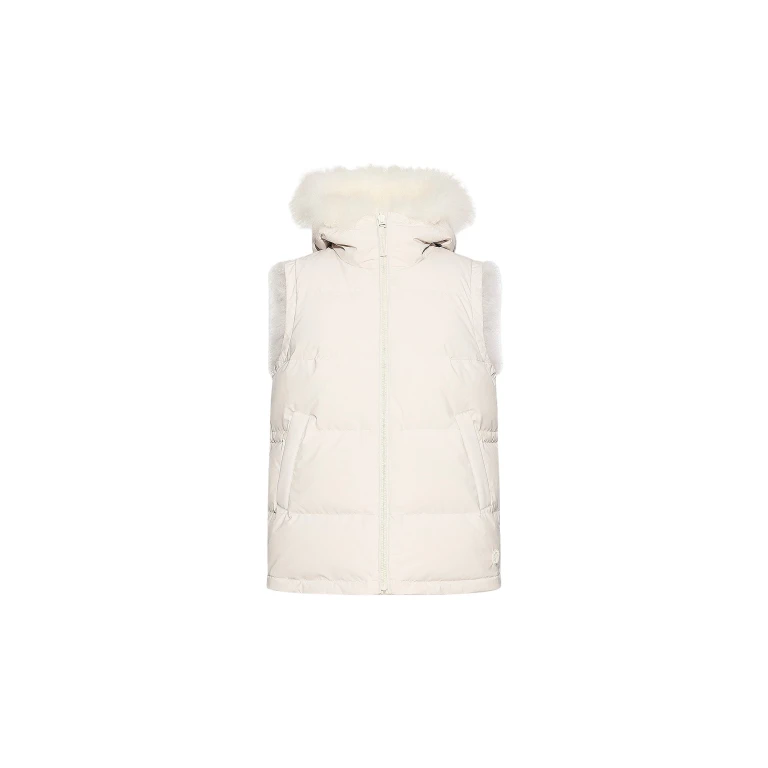Woman wearing Yves Salomon shearling fur coat – luxury outerwear at Luxury Shoes 