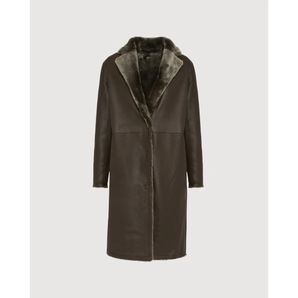 Woman wearing Yves Salomon shearling fur coat – luxury outerwear at Luxury Shoes 