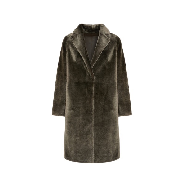 Woman wearing Yves Salomon shearling fur coat – luxury outerwear at Luxury Shoes 