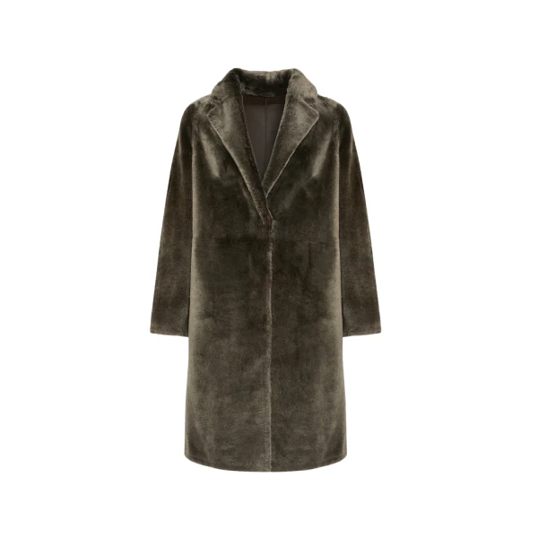 Woman wearing Yves Salomon shearling fur coat – luxury outerwear at Luxury Shoes 