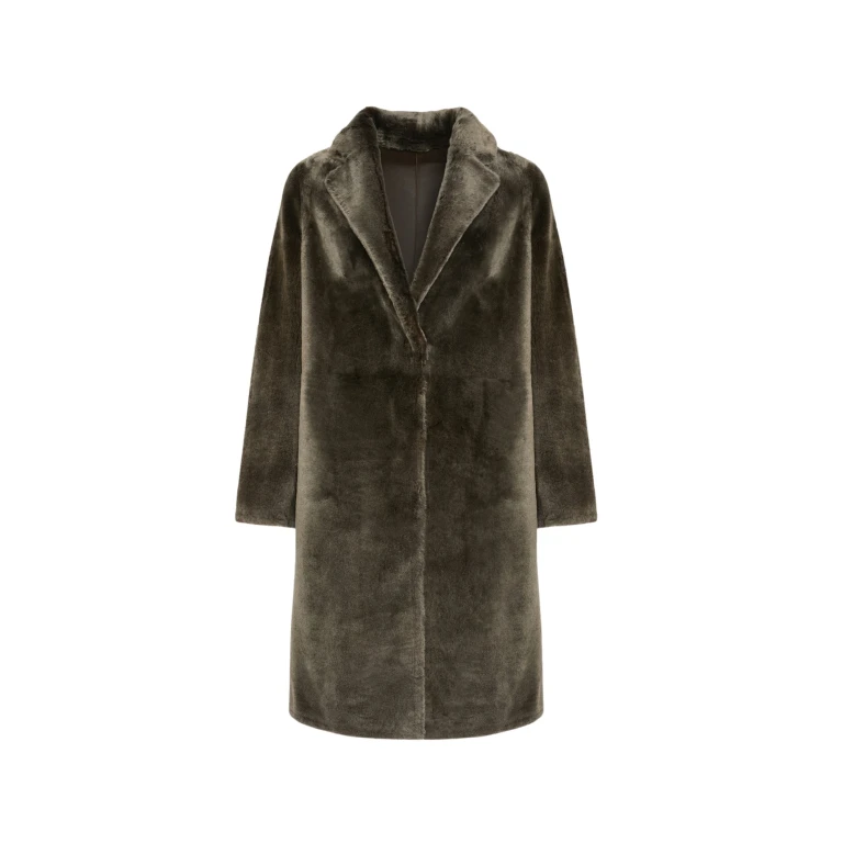Woman wearing Yves Salomon shearling fur coat – luxury outerwear at Luxury Shoes 