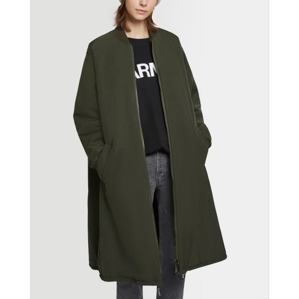 Woman wearing Yves Salomon shearling fur coat – luxury outerwear at Luxury Shoes 