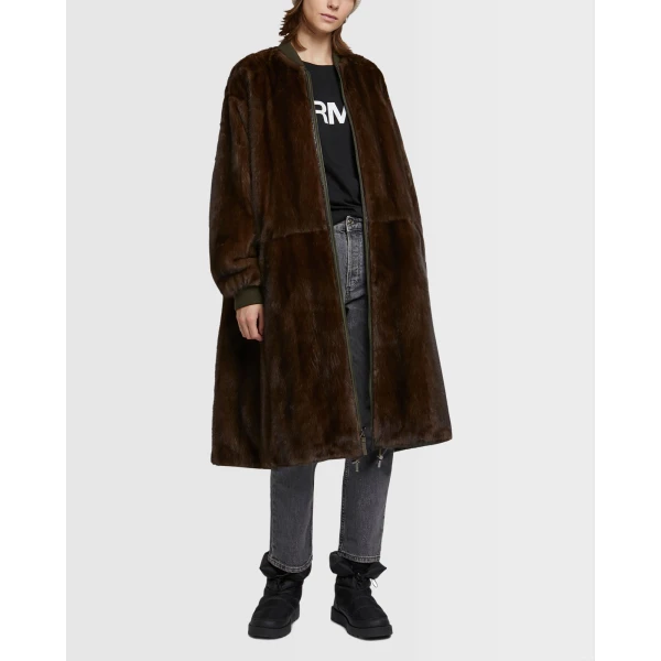 Woman wearing Yves Salomon shearling fur coat – luxury outerwear at Luxury Shoes 