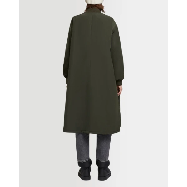 Woman wearing Yves Salomon shearling fur coat – luxury outerwear at Luxury Shoes 