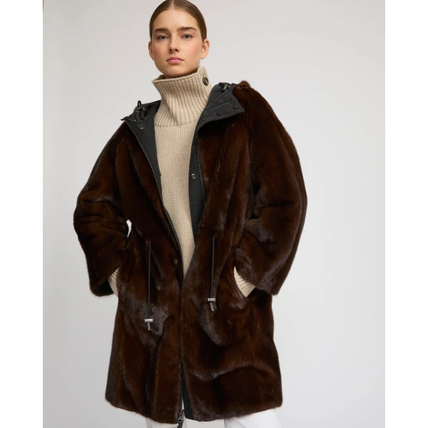 Woman wearing Yves Salomon shearling fur coat – luxury outerwear at Luxury Shoes 