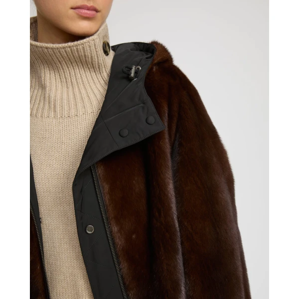 Woman wearing Yves Salomon shearling fur coat – luxury outerwear at Luxury Shoes 