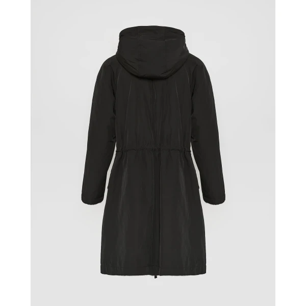Woman wearing Yves Salomon shearling fur coat – luxury outerwear at Luxury Shoes 